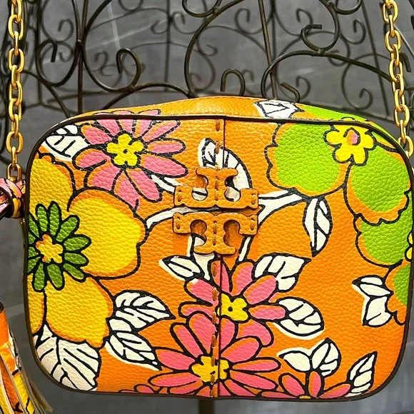 Tory Burch camera bag crafted of leather with floral motif. - Picture 1 of 17